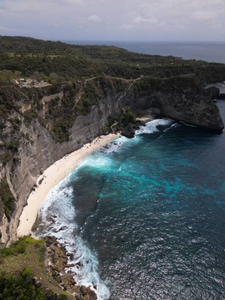 istock Vertical bird's eye view of a seacoast surrounded by cliffs 1440531446