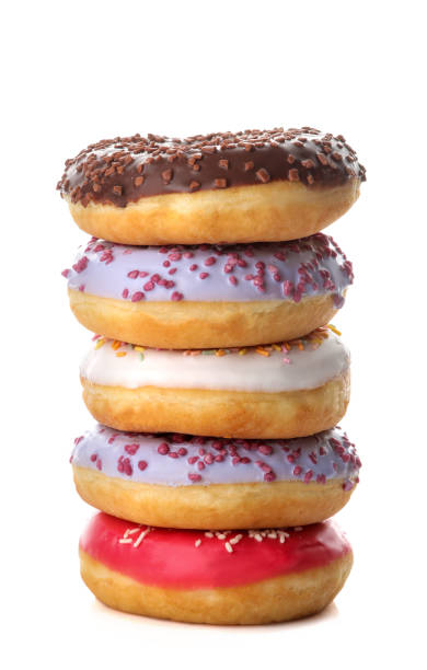 istock Sweet donut with icing and sprinkling in a stack close-up on a white isolated background 1440531687