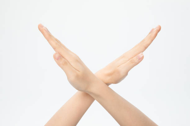 istock Pair of hand gesturing no isolated on a white background 1440532761