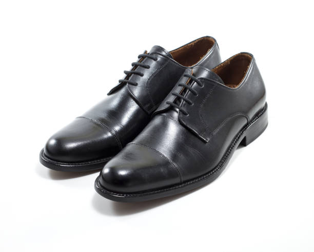 istock Men's classic black shoes isolated on white background 1440532982