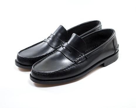 A men's black loafers isolated on white background