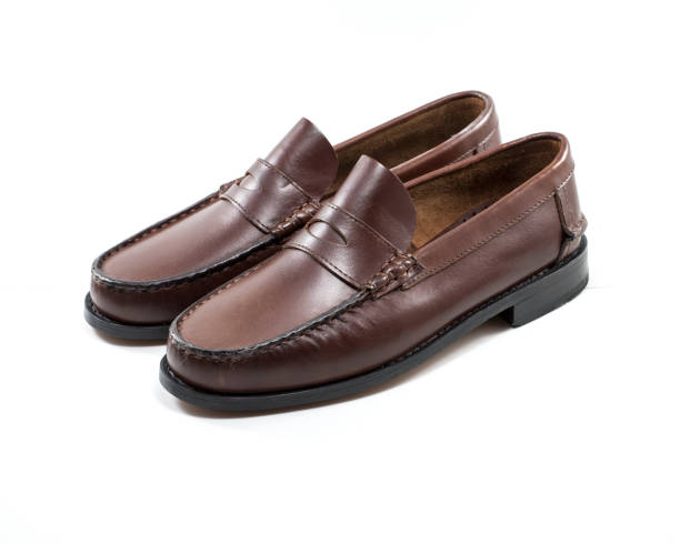 istock Men's brown loafers isolated on white background 1440533043