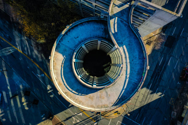 istock Top view of the circular parking on a sunny day 1440535480
