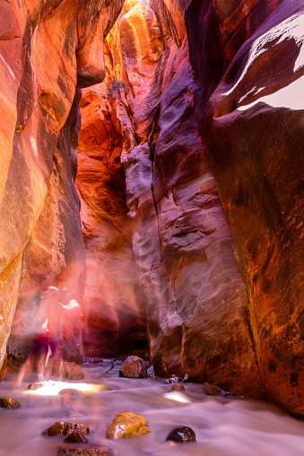 a vertical light exposure shot of the inside of kanarra falls