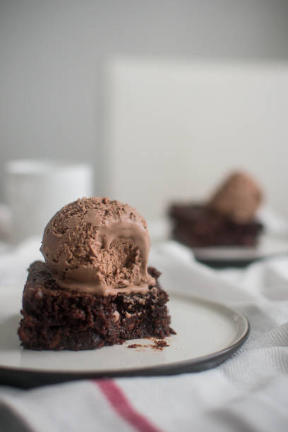 istock Chocolate brownie with ice cream 1440536587