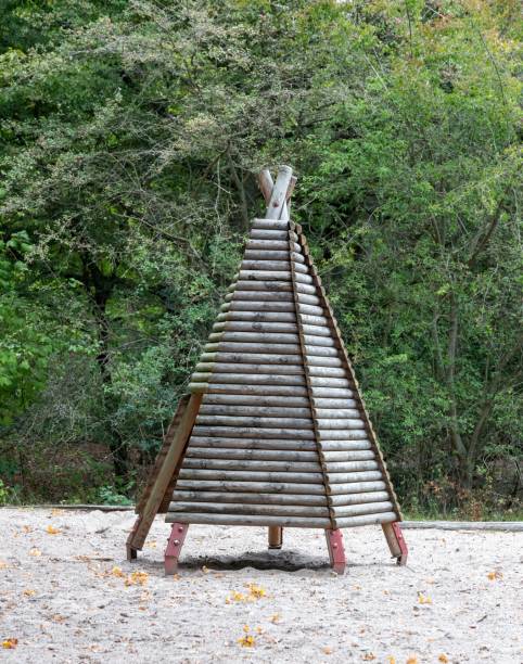 Playground with various wooden devices in the forest