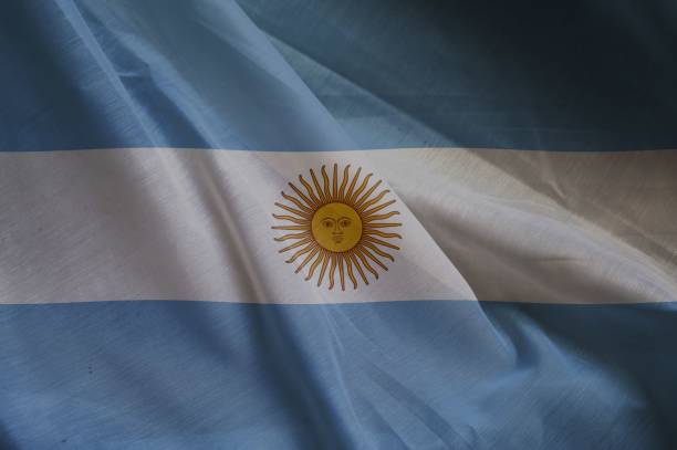 istock silky realistic fabric country flag 1440538474