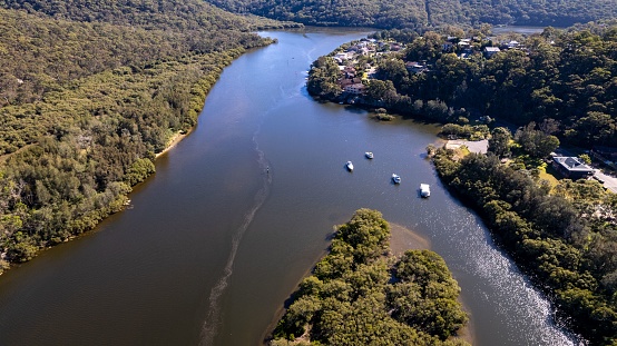 Aerial view of Woronora River surrounded by lush greenery in Sutherland Shire, Sydney, New South Wales, Australia