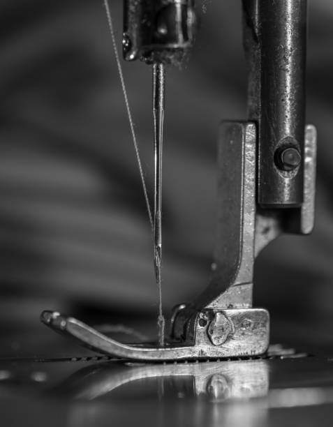 istock Vertical grayscale shot of a sewing machine 1440539939