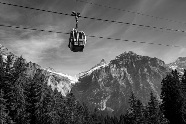 istock low angle view of cable cars against snowcapped mountain range 1440540381