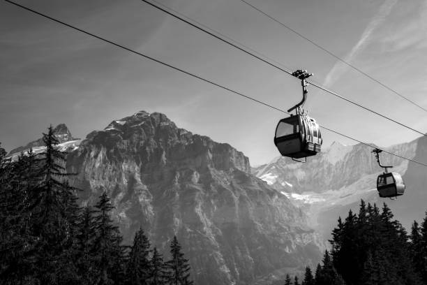 istock low angle view of cable cars against snowcapped mountain range 1440540409