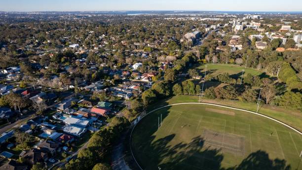 istock Sutherland Oval and Sutherland suburb surrounded by lush greenery at dusk. Sydney, NSW, Australia 1440540663