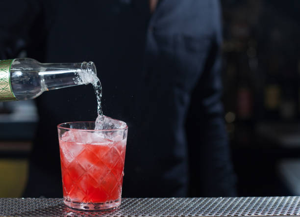 istock Bartender making an alcoholic cocktail, a summer cocktail in the bar 1440541450