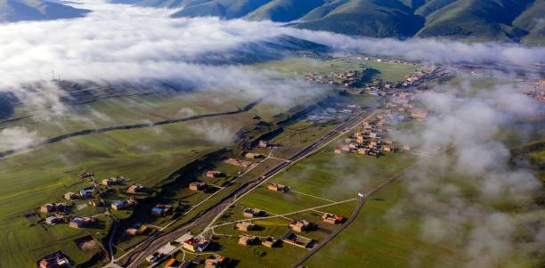 Free Stock Photo of Aerial View of Small Town Surrounded by Mountains ...