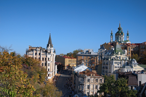 Kyiv, Ukraine-October 08,2022:Aerial landscape view of Andrew's Descent (Andriyivsky uzviz) with walking people. Sometimes tour guides and operators call this street as \