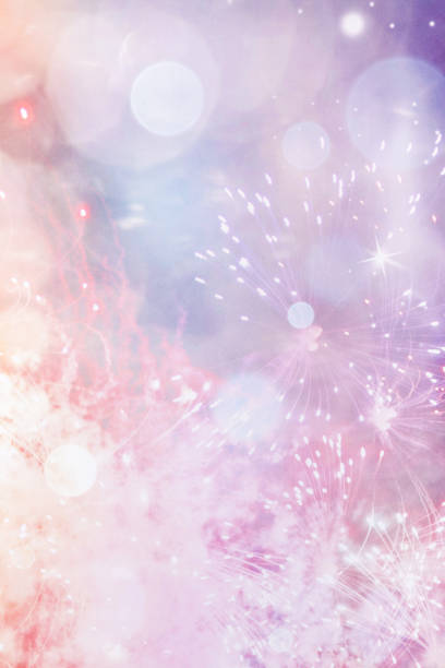 istock Vertical abstract shot with shiny bokeh lights and fireworks 1440542471