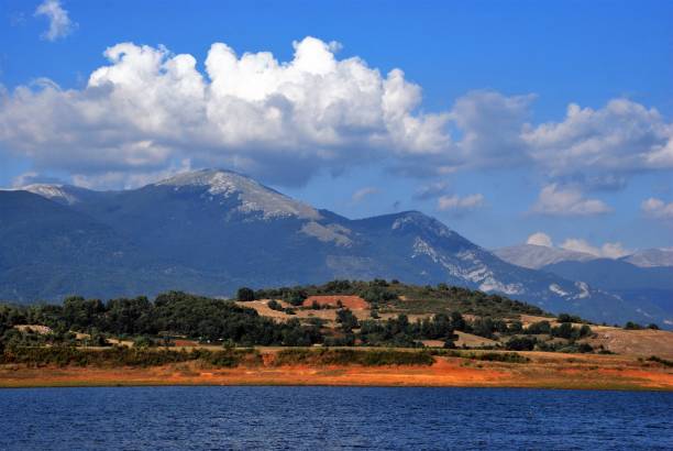istock Scenery with clouds by the lake 1440542624