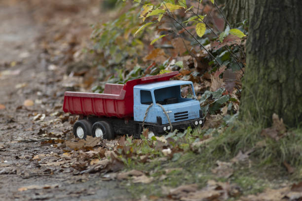 Toy story abandoned truck surrounded by fall leafs