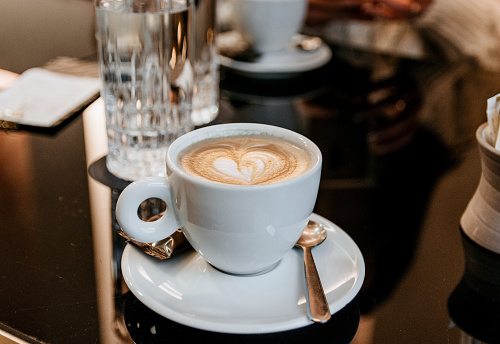 A high angle shot of caffe latte in the cafe