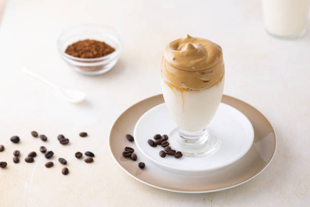 istock Soft focus of dalgona coffee topped with chocolate chips and a cinnamon stick 1440543144