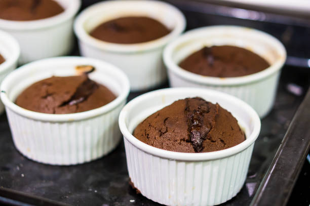 istock Selective focus shot of chocolate muffins in white cups 1440543161
