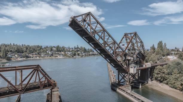 istock Railway bridge lifting on a cloudy blue sky 1440543362