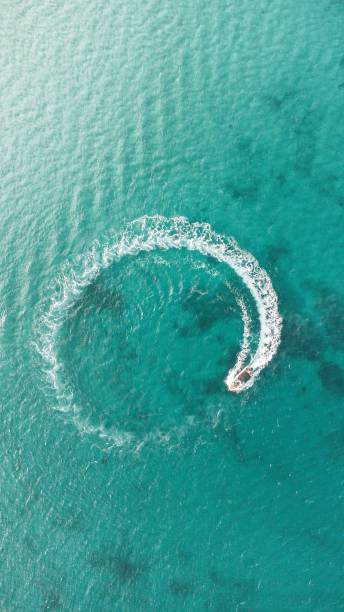 istock Speed boat sailing with high speed circling motion in the ocean 1440543453