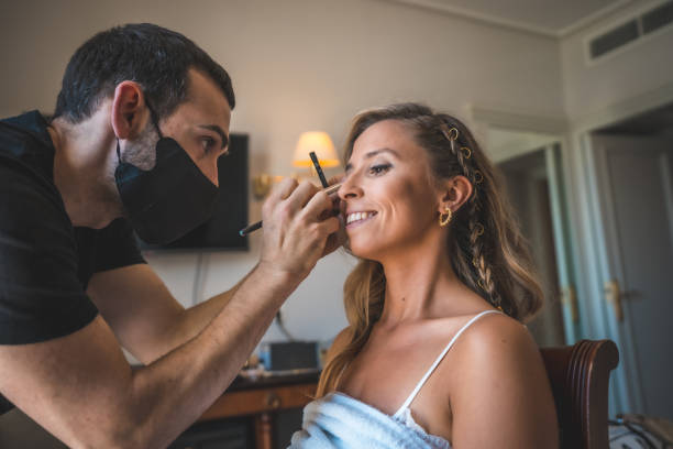 istock Shot  of a makeup artist doing a makeup 1440544197