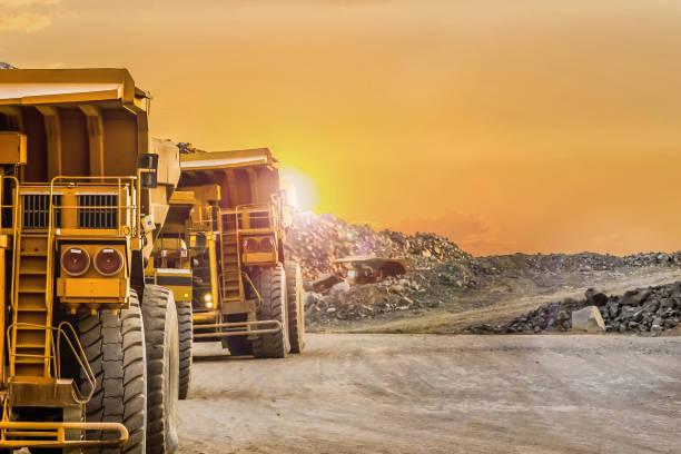 istock Trucks riding into a platinum mining site in South Africa 1440544248