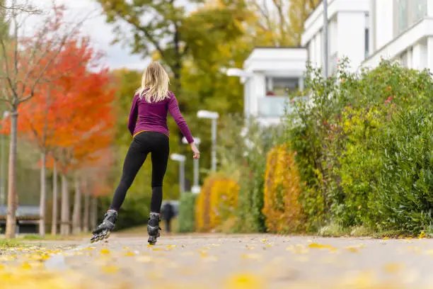young woman in healthy lifestyle, active with inline skating