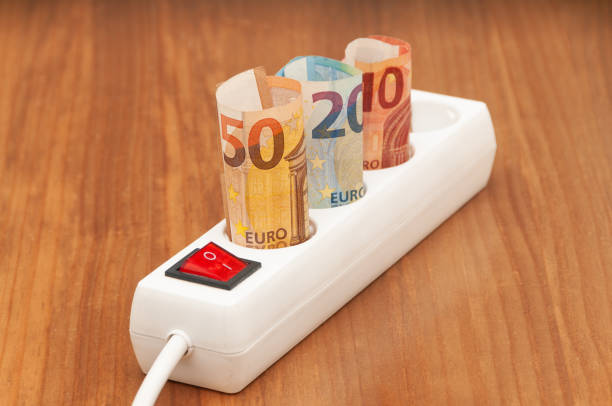 istock White power strip with rolled euro banknotes 1440544744