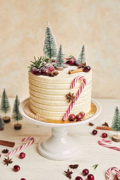 istock Vertical shot of a white Xmas cake on a white plate 1440547638
