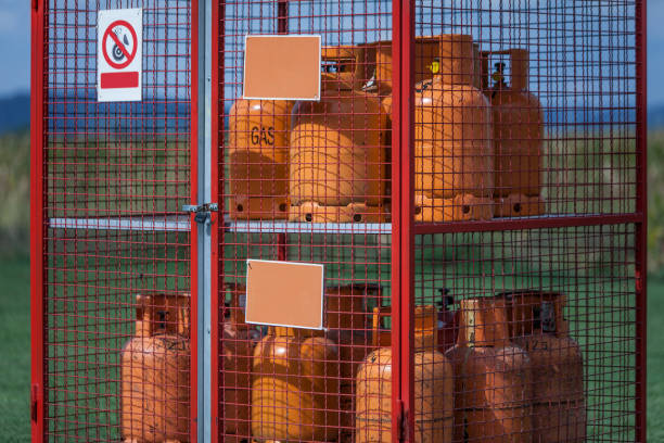 istock Closeup of a gas storage cage with cylinders 1440548891