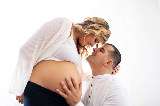 istock Pregnant couple in love 1440550985