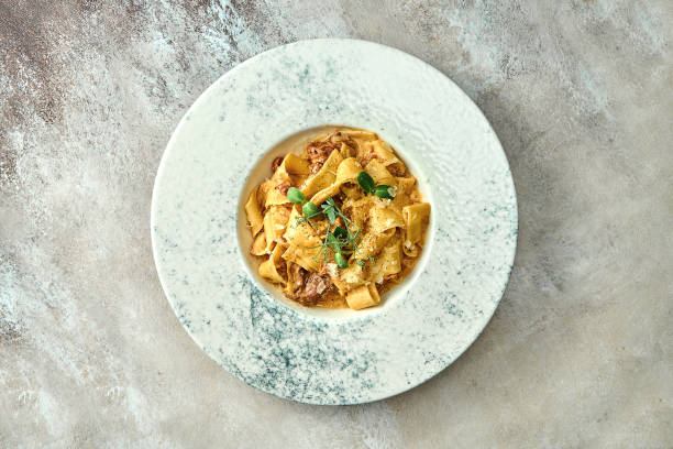 istock Pasta with veal and parmesan in a plate. Close-up, selective focus. 1440551040