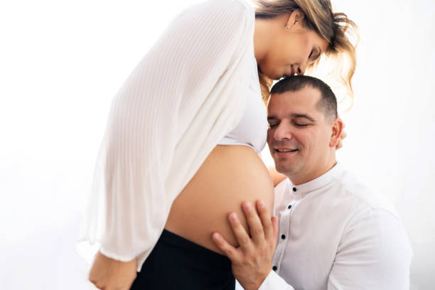 istock Pregnant couple in love 1440551054