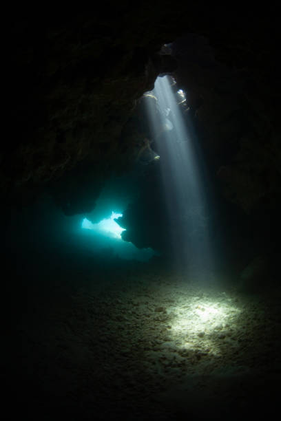 istock Beams of Sunlight in Underwater Cavern 1440551065
