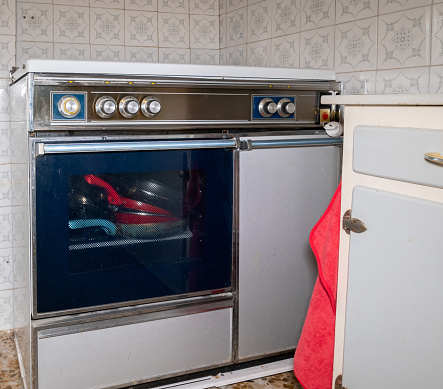 An old retro oven in an old style kitchen