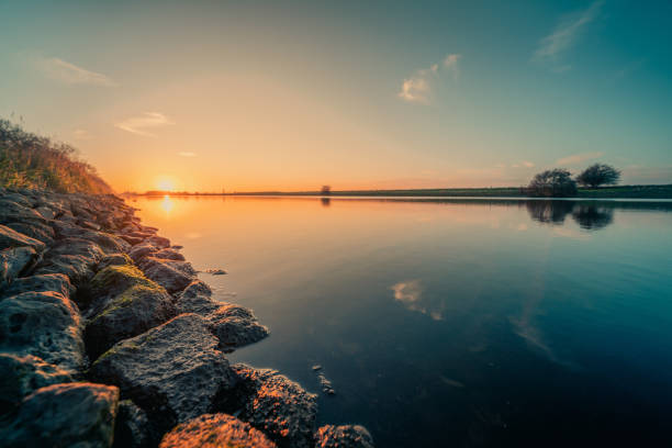 The sunset at the canal through Walcheren in the Netherlands