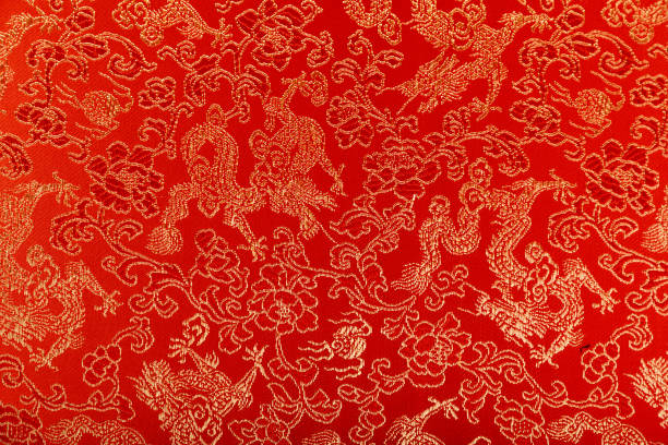istock Top view of Chinese patterns on red fabric 1440553432