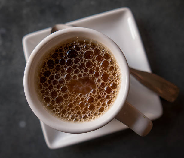 istock Top view of a coffee with bubbles in a cup 1440554048