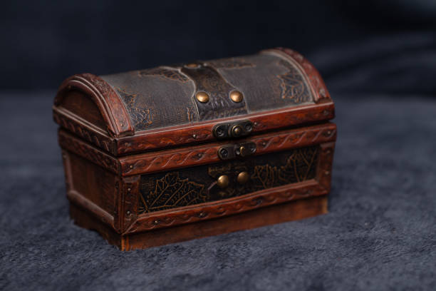 istock Closed brown jewelry box isolated on the dark gray surface 1440554161