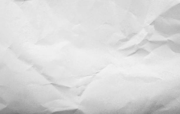 istock Texture of a white crumpled paper 1440554231