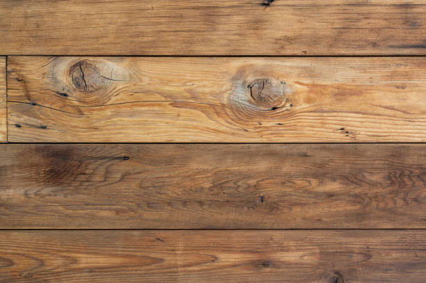 istock Brown wooden planks background texture 1440555421