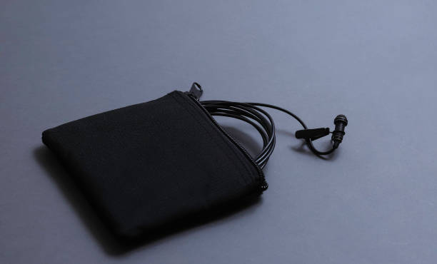 istock zipped cloth bag with a studio microphone lavalier. Shallow depth of field 1440555600