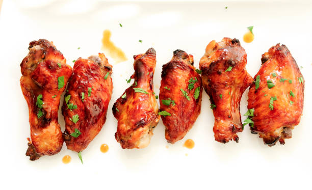 honey garlic chicken wings asian style honey garlic chicken wings nub stock pictures, royalty-free photos & images