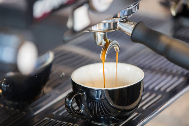 istock High angle shot of coffee extraction pouring into a cup 1440556168