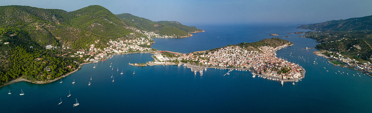 A panoramic aerial shot of the beautiful island Poros, in Greece during daylight