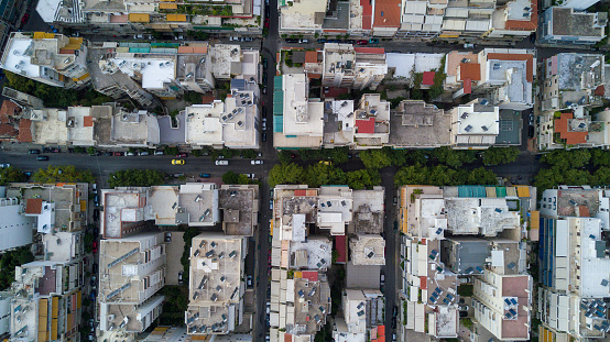 An aerial shot of buildings in Athens at daytime in Gre