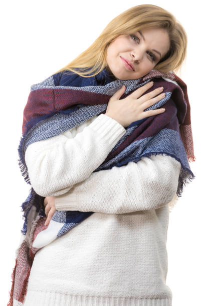 istock Woman wearing warm scarf 1440556536